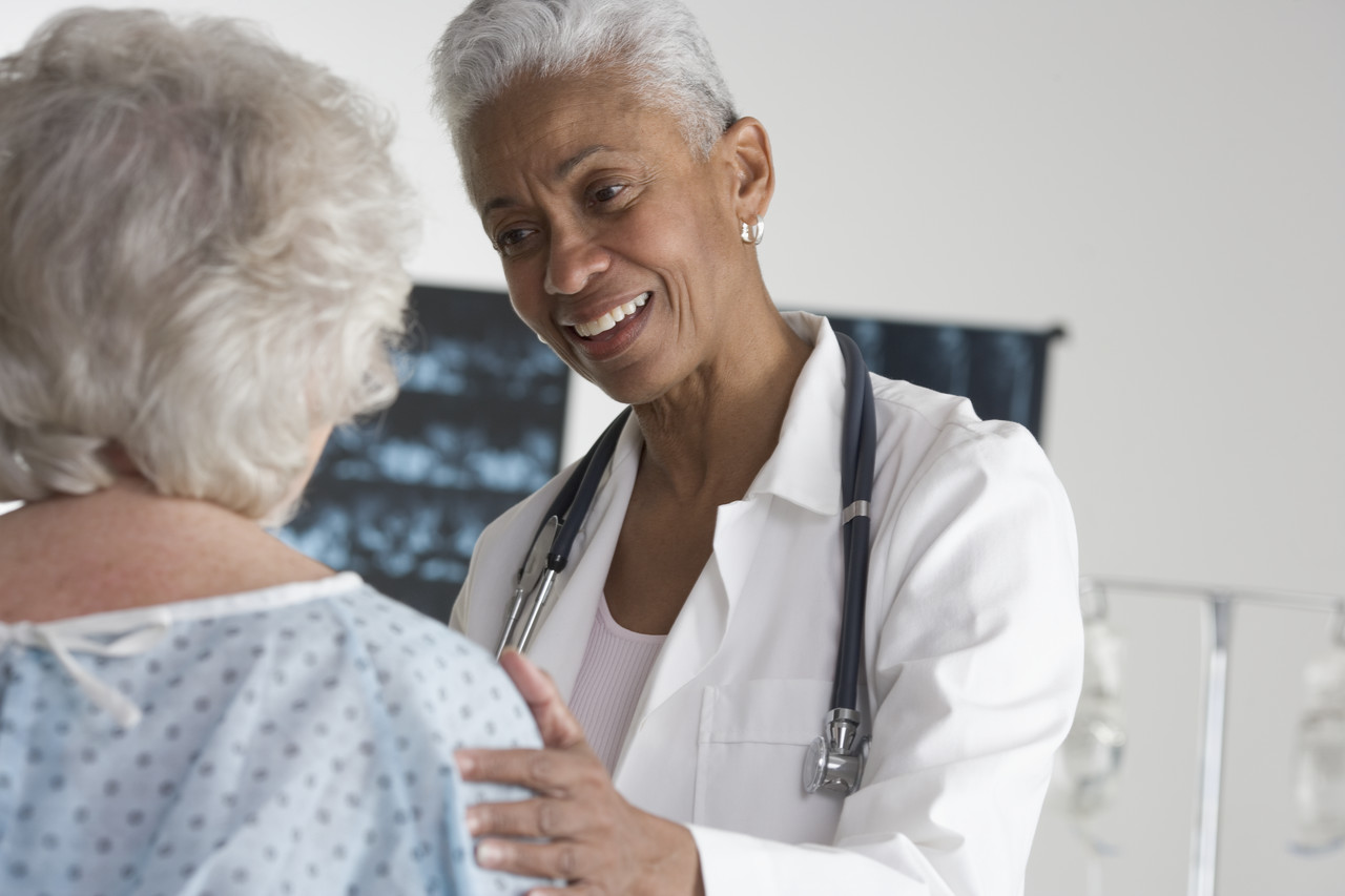 doctor and elderly patient