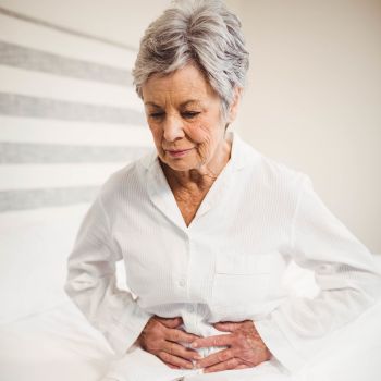 mind body organ woman touching stomach