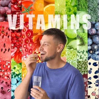man taking a multivitamin